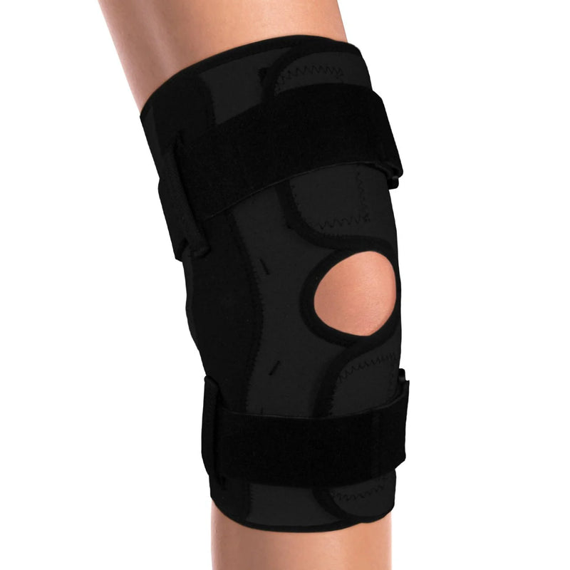 Ea/1 Otc Medium Neoprene Knee Stabilizer Wrap W/ Polycentric Hinged Bars Medium (16-18)" Black Reversible Opens Flat W/ Upper & Lower Adjustable & Removable Hook & Loop Straps 4-Way Stretch Plush-Lined Latex-Free